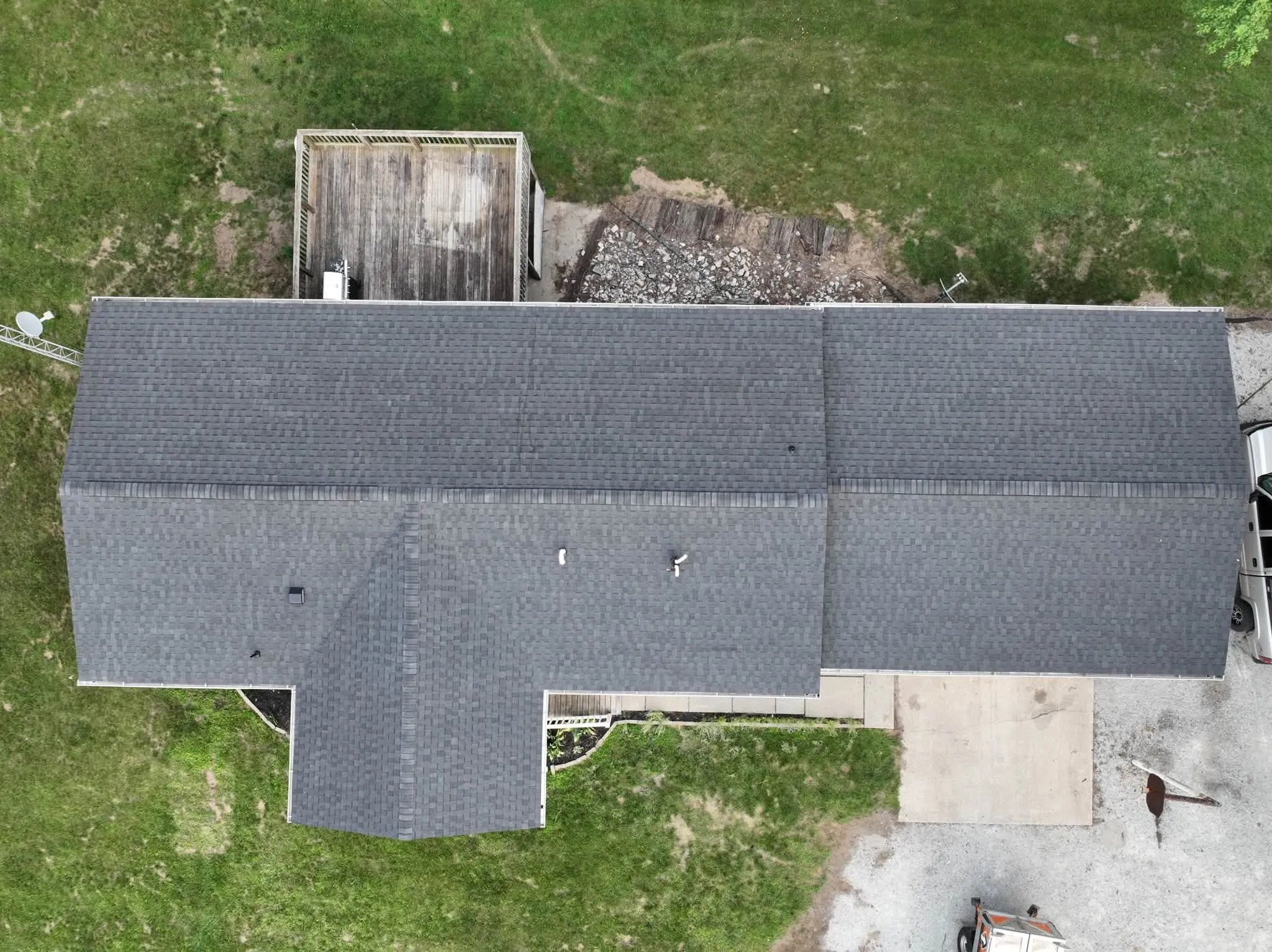 Straight-down view of the completed roof, unbroken across the slopes where the skylights had been