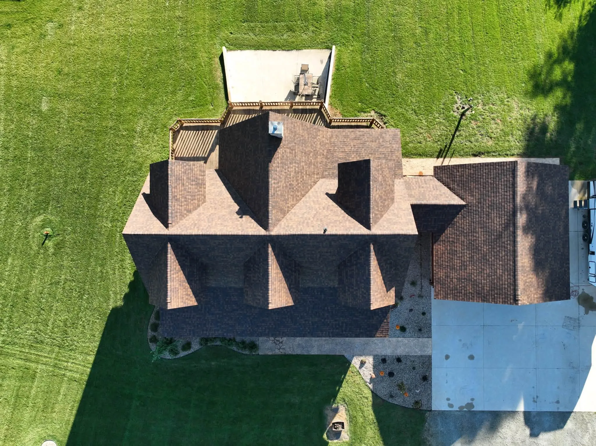 Straight-down view of the roof, with the dormers, the many valleys, and the deck off the back