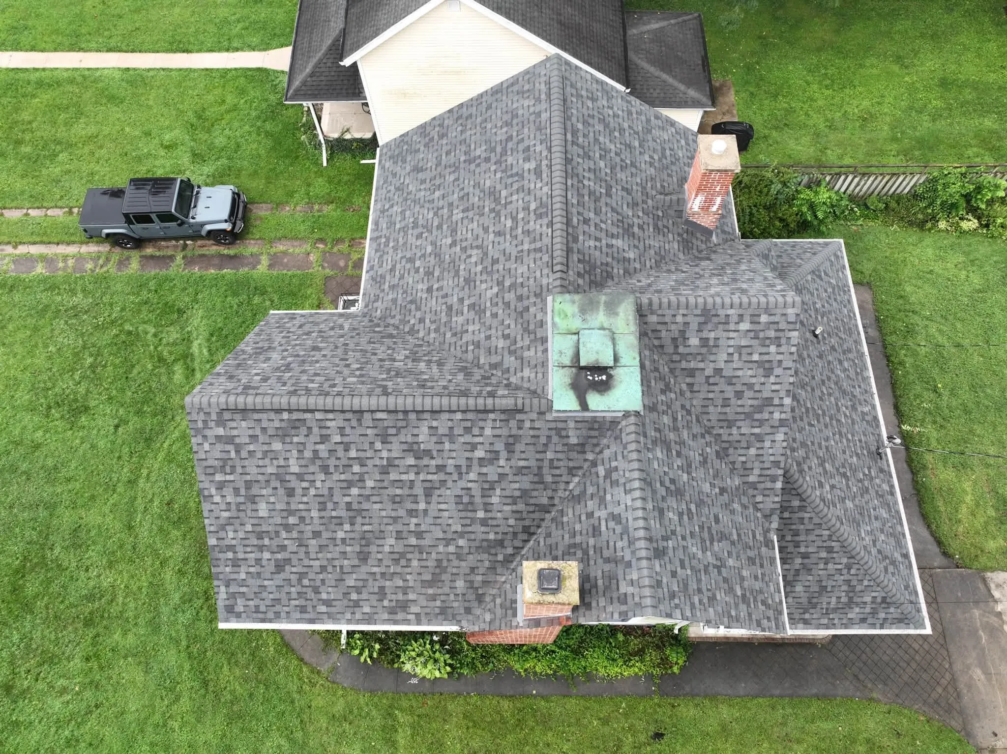 Another overhead view of the finished roof, working around both chimneys