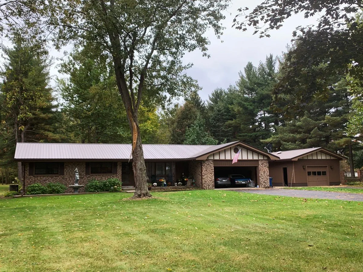 Metal roof replacement on a brick ranch