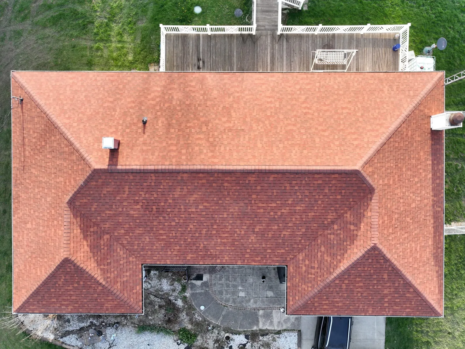 Terracotta shingle hip roof seen from above