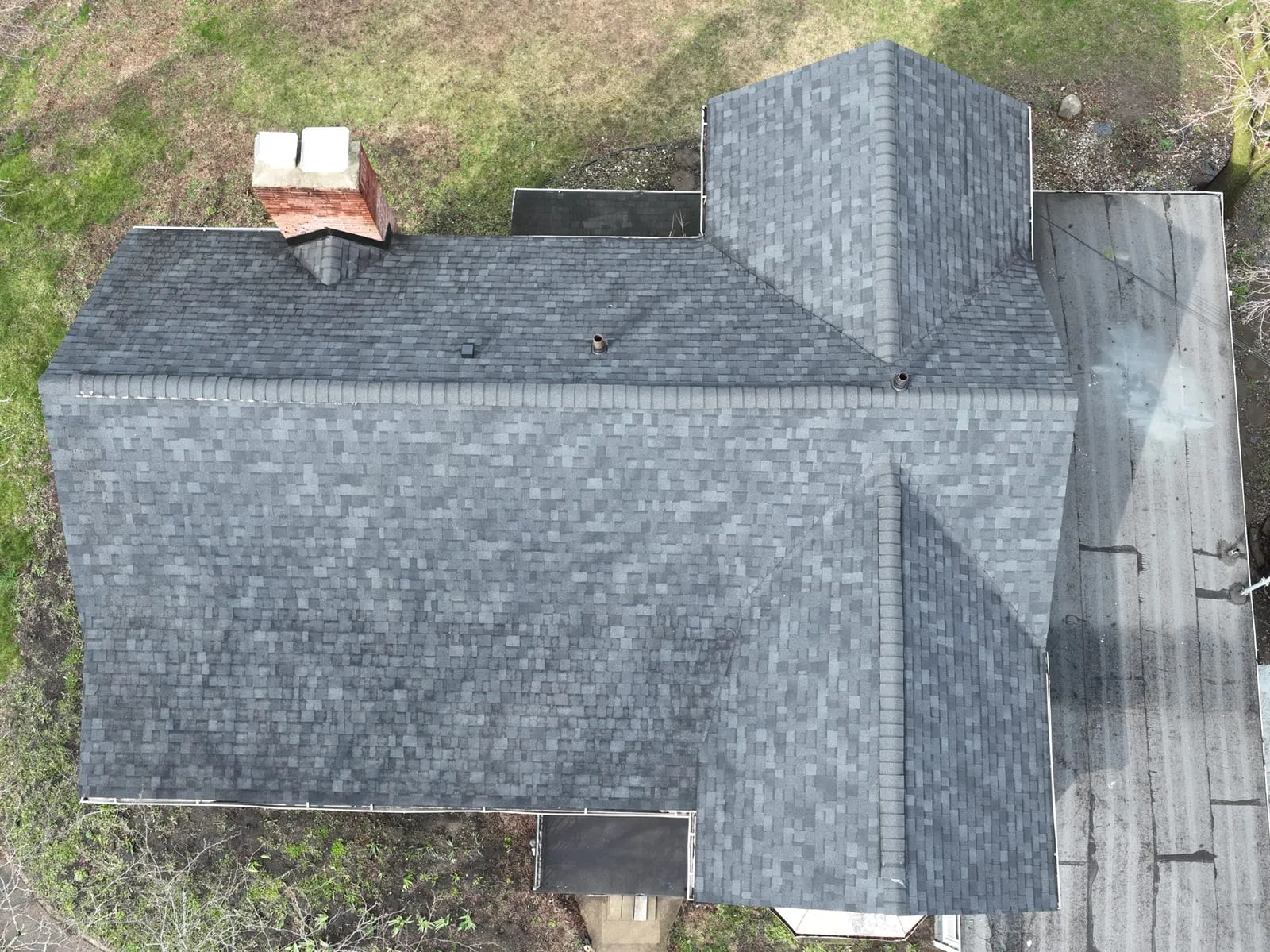 Grey architectural shingle roof seen from above